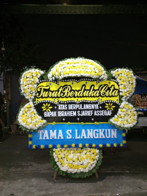 Papan Bunga Duka di Modelomo